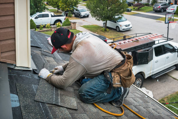 Professional Storm Damage Roof Repair technician working in Newtown Square, PA